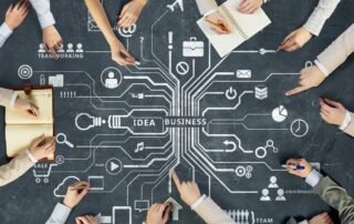 People writing on a board