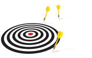 A darts game where darts are not hitting the circle.