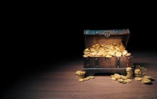 A safe with golden coins symbolizing finding luck.